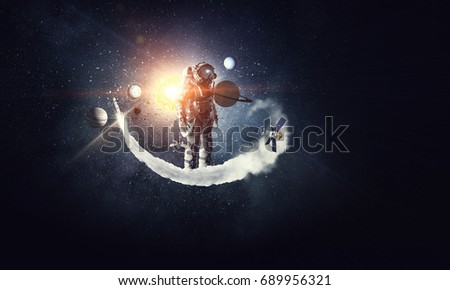 Astronaut surfing dark sky. Mixed media