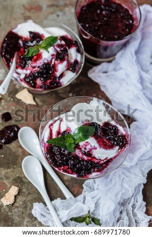 Vanilla ice cream with jam on  background