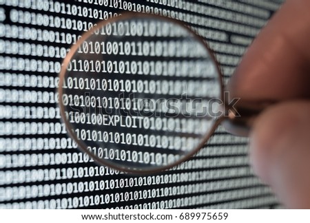 Exploit found with magnifying glass lupe Royalty-Free Stock Photo #689975659