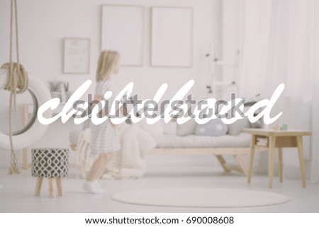 Blonde girl in pastel scandinavian room seen through photo filter
