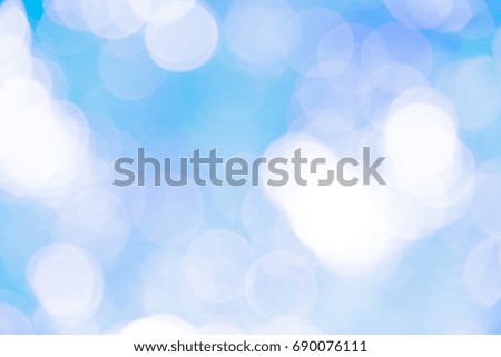 Blue and white bokeh background from natural