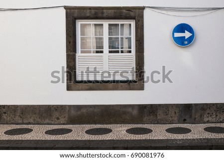 Window and a traffic sign
Window on a white wall and a traffic sign. Footpath with contrast pattern. Ponta Delgada, Sao Miguel, Azores Islands, Portugal