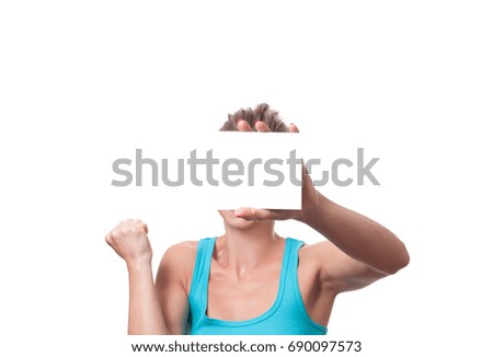 Woman showing empty paper card sign with copy space for text. 