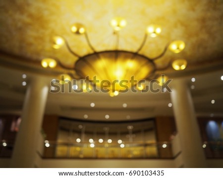 Blur picture of Chandelier at the ceiling