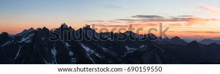 Beautiful aerial panoramic landscape view of Mt Rexford near Chilliwack, East of Greater Vancouver, British Columbia, Canada. Picture taken during a colorful sunset.