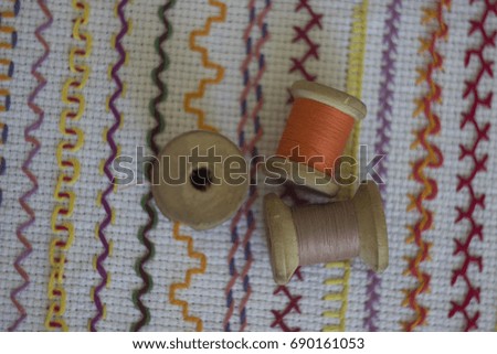 Coils with colored thread
