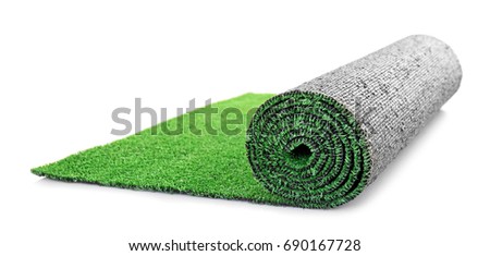 Roll of artificial grass mat on white background