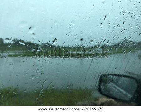 Rainy day. Car window.
