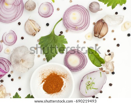 garlic onion pepper colorful spices on white background