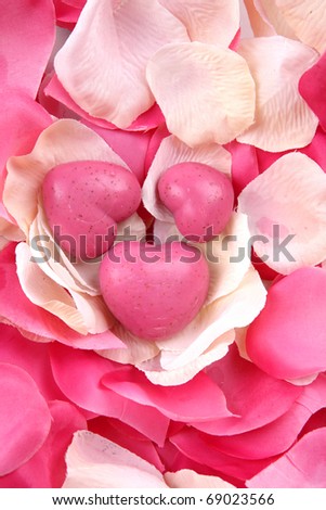 Pink hand made soap heart shaped and pink rose petals