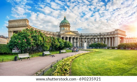 A quiet summer sunny evening at the Kazan Cathedral in St. Petersburg and lilac bushes Royalty-Free Stock Photo #690235921