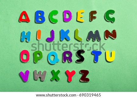 English Alphabet on Green background all capital letters