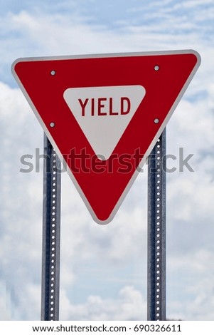 Red and White Yield Sign