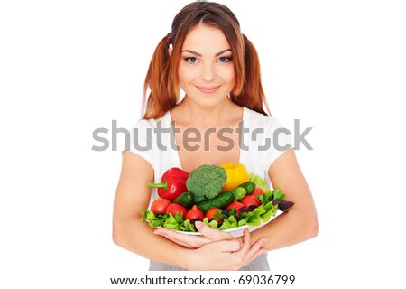 portrait of happy woman with vegetables. isolated on white