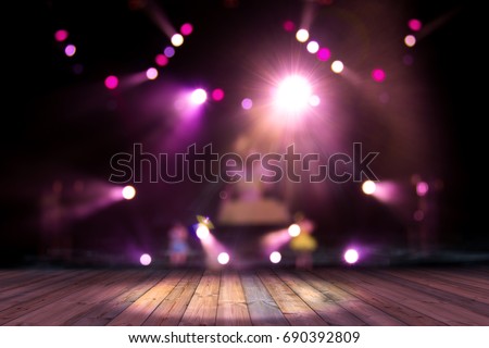 top wood desk with light bokeh in concert blur background,wooden table