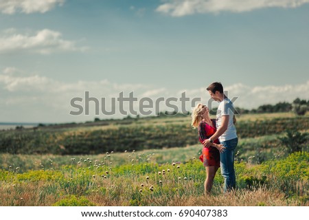 The couple in love for a walk in nature