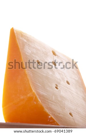Cheese Wedge from shot from low angle isolated on white background