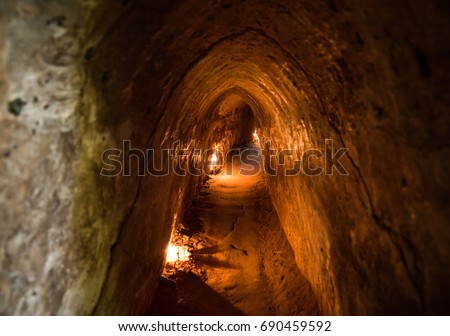 Famous Cu Chi tunnels. Vietnam Royalty-Free Stock Photo #690459592
