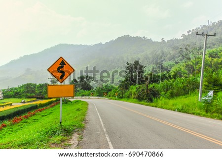 Sign board Left Winding Road ,