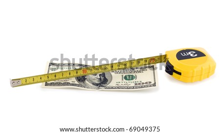 one hundred bill in US currency and tape measure isolated on white background