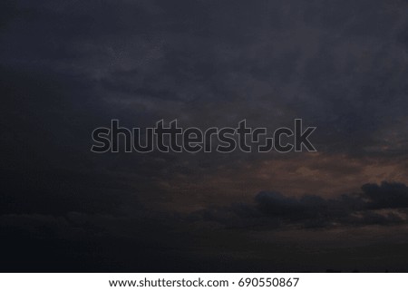 orange blue sky background with cloud and town building in evening of the day sunset