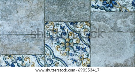 Abstract, geometric, tiled pattern of solid stone