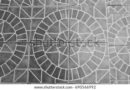Floor tile in the form of a circle texture. Black and white