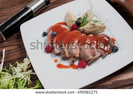 Steak chopped with ketchup