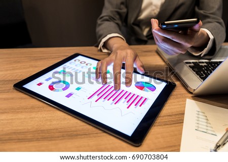 young businesswoman using tablet PC.