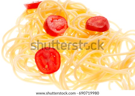 Spaghetti and tomatos cooked suspended in the air, pasta in backlight, background