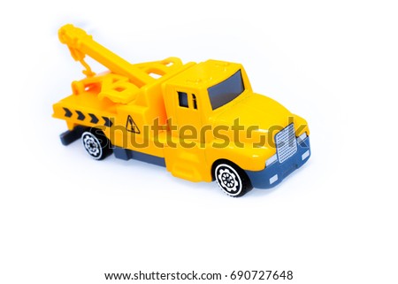 Toy trucks for Kids towing vehicle yellow on white background