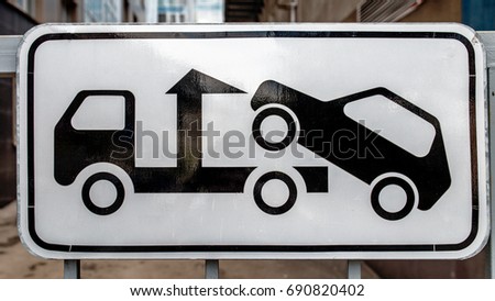 road sign of tow truck evacuator with reflective layer