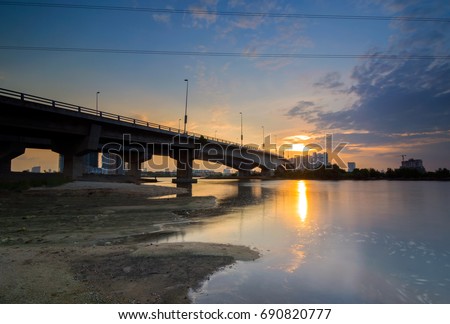 Long exposure image of sunset moment at Permas Jaya Bridge (Jambatan Permas Jaya), Johor Bahru, Malaysia. Soft focus in full resolution.