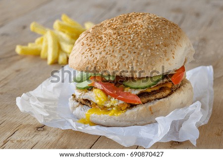 homemade hamburger on white paper