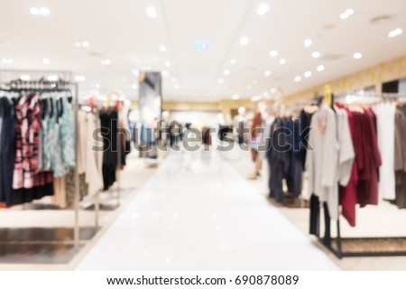 Abstract blur and defocused shopping mall in department store interior for background Royalty-Free Stock Photo #690878089