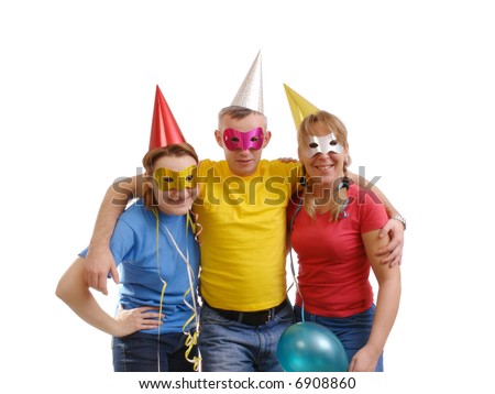 Group of friends wearing party masks and hats posing over white