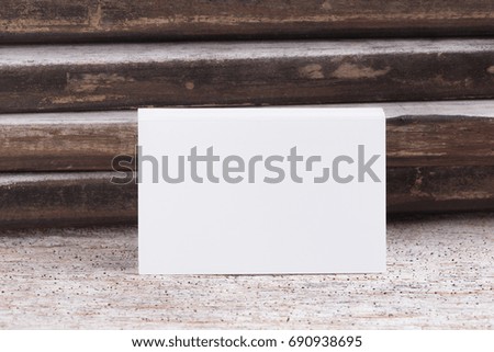 Business card blank on wooden  background