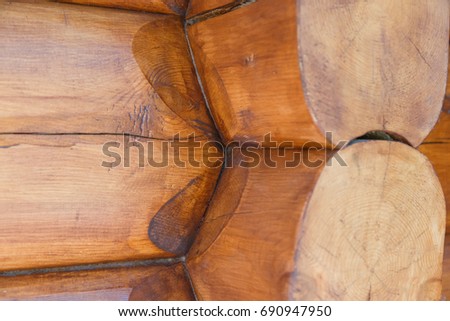 Details of cabin corner joint with round off logs. Canadian or scandinavian style. Close up