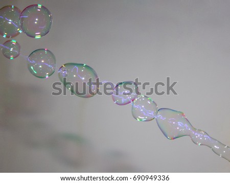 A photograph of luminescent bubbles in motion. This photo was taken in Brisbane, Australia. 