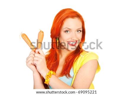 picture of lovely woman showing a carrots