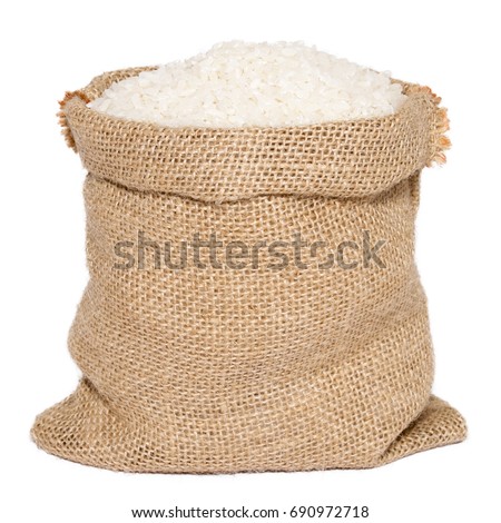 White rice in burlap sack bag isolated on white background
 Royalty-Free Stock Photo #690972718