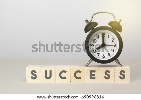 Black Alarm Clock & Wooden Block With Copy Space, Time for Success Concept.