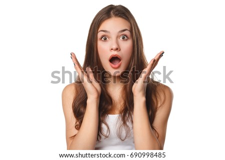 Surprised happy beautiful woman looking sideways in excitement, isolated on white background
