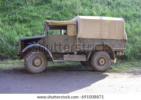 Old military car, old army transport car. Royalty-Free Stock Photo #691008871