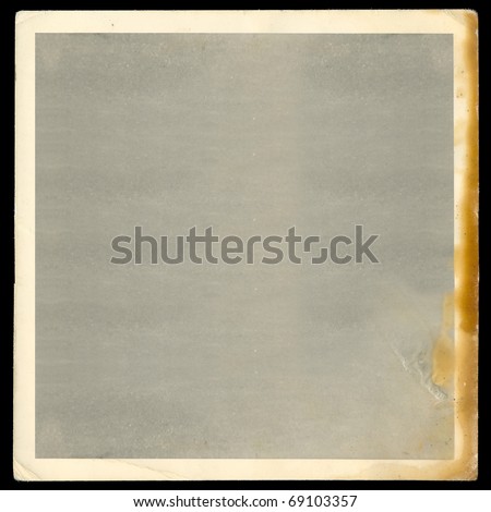 Vintage old blank burned photograph design element with white border. Royalty-Free Stock Photo #69103357