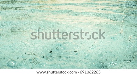Water in the swimming pool. 