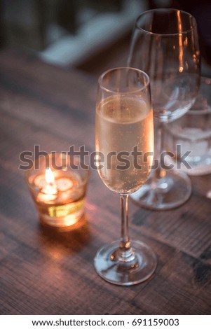 Single Champagne glass on a table outdoor