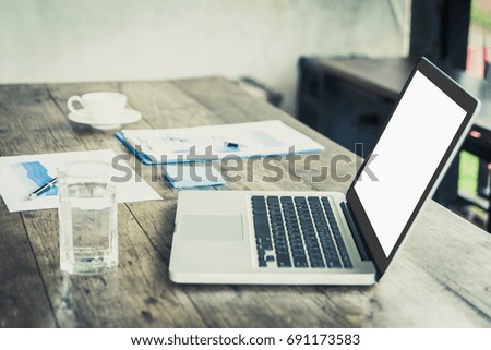 Office wood table with laptop mock-up, notebook, pen, coffee cup
