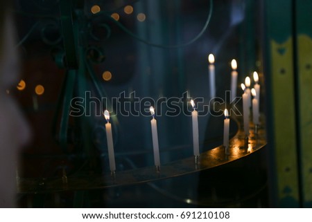 Candle light in glass cabinet - Vintage Concept.