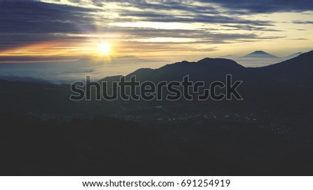 Picture of beautiful sunset on the mountain valley in evening time